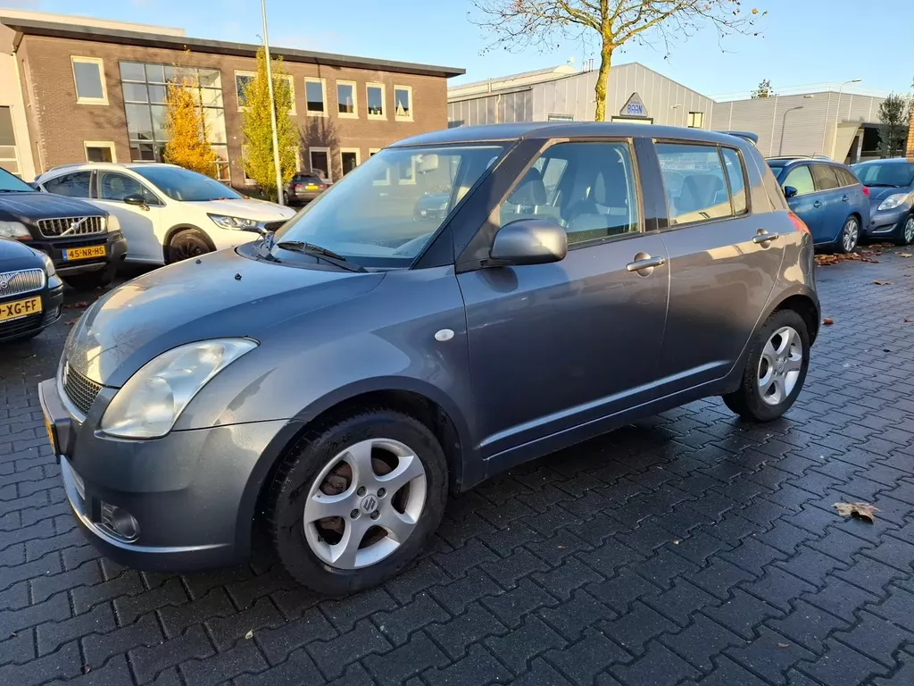 Suzuki Swift 1.3 Exclusive AIRCO/5DEURS/VERSNELLINGSBAK SCHUURT!